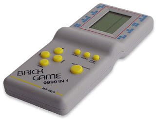 A handheld Brick Game console, “9999 in 1”